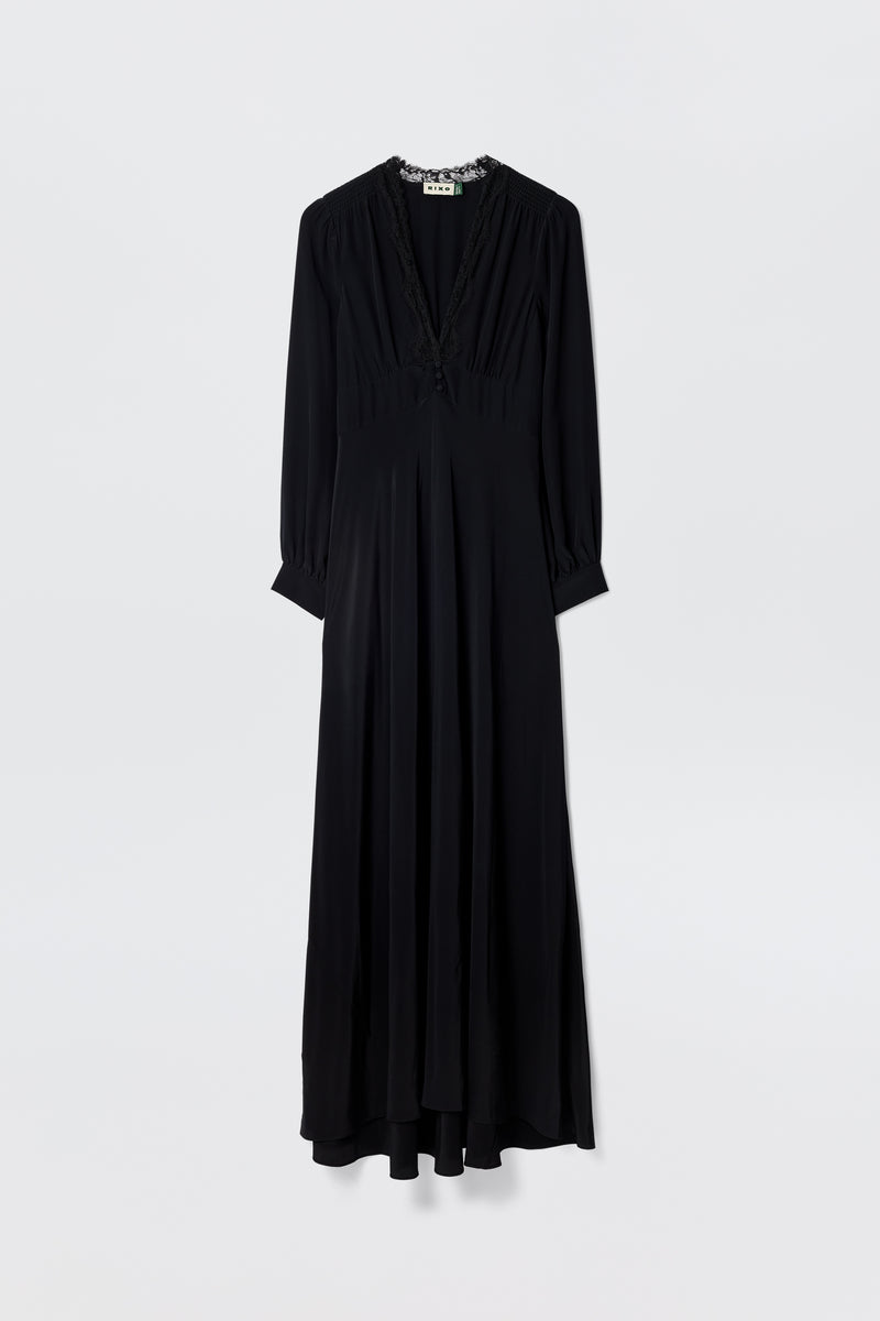 Presenting “Emory - Black”: a long-sleeved, floor-length dress made from luxurious black silk crepe de chine, designed with a V-neckline and subtle waist gathers. Shown against a plain white background, this elegant piece is perfect for special occasions.