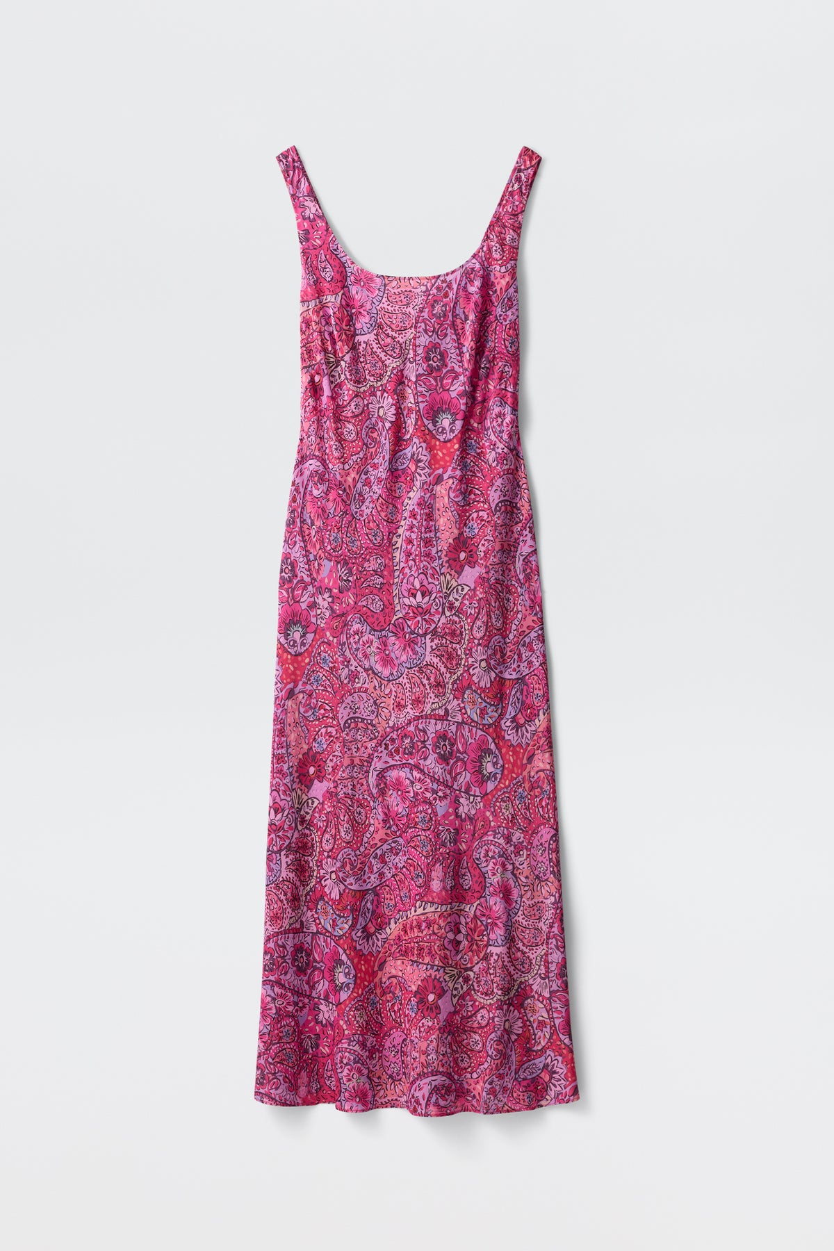A sleeveless, long red dress with thin straps and a colorful paisley floral pattern, displayed flat against a plain white background.