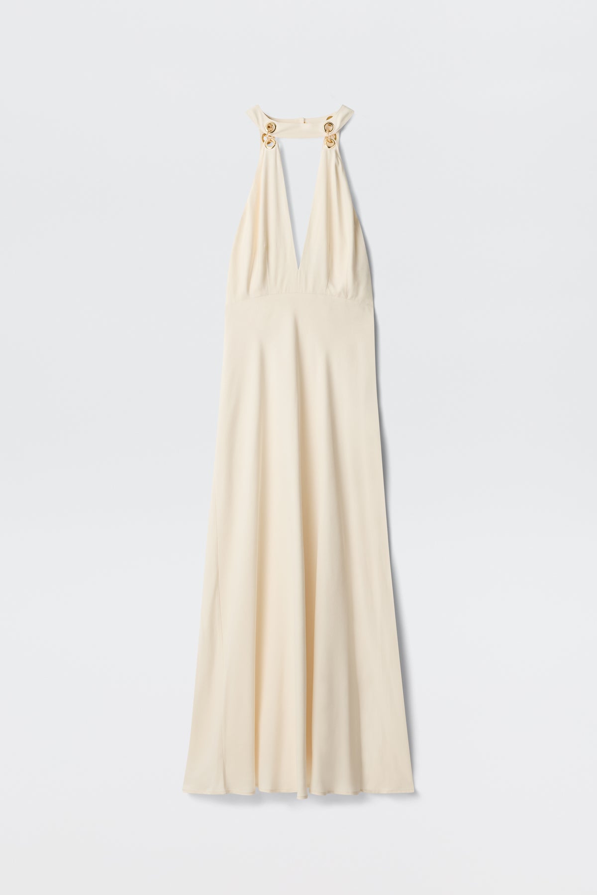 The Eleanora - Pearl dress is a vintage-inspired ivory, sleeveless floor-length gown with a deep V-neck, halter straps, gold ring accents on the shoulders, and a bias-cut hem, shown against a white background.