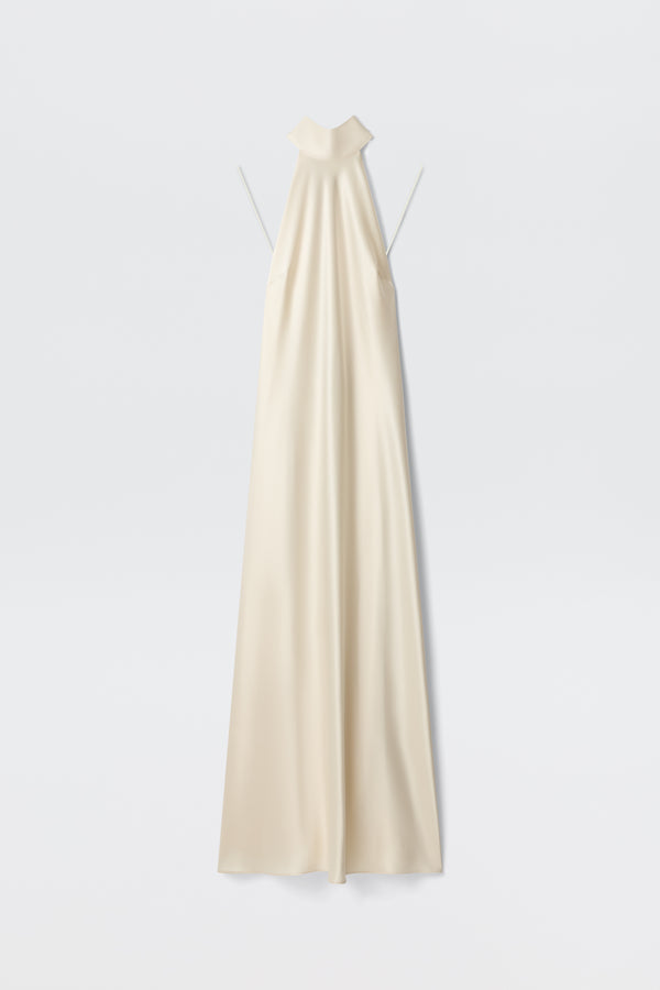 The Arista - Pearl is an elegant, long ivory satin dress with a high neckline, halter-style top, and thin straps. Displayed on a plain white background, it features a smooth, flowing silhouette.
