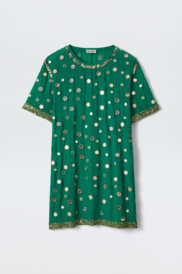 A dark green short-sleeve dress from Cruz, featuring gold and silver circular Lume embellishments and intricate gold beading along the neckline, sleeves, and hem.