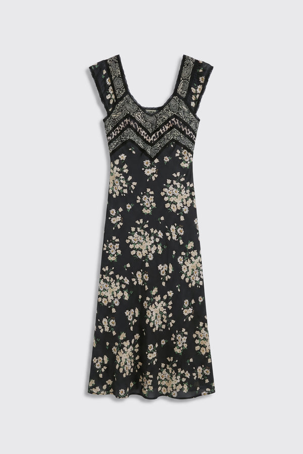 Bailee - Amelia Gremlin Mix Black is a sleeveless black dress with a V-shaped neckline, adorned with white embroidery and floral patterns throughout. It features a fitted bodice and a slightly flared hem.