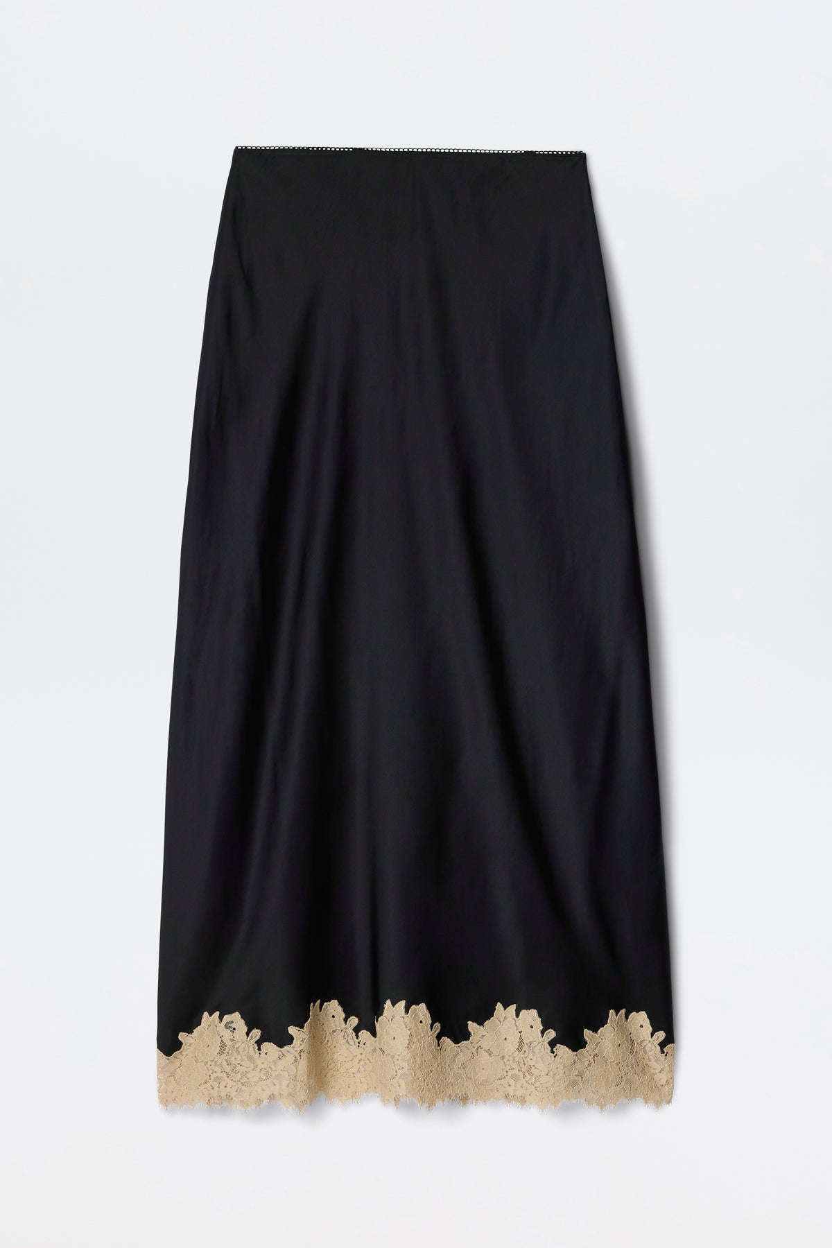 Matilde - Black: A long black skirt featuring a scalloped beige lace trim at the hem, displayed against a plain white background.