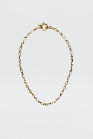 The Lorene - Gold is a vintage-inspired gold-plated necklace with oval links and a round spring ring clasp, elegantly showcased against a plain white background.