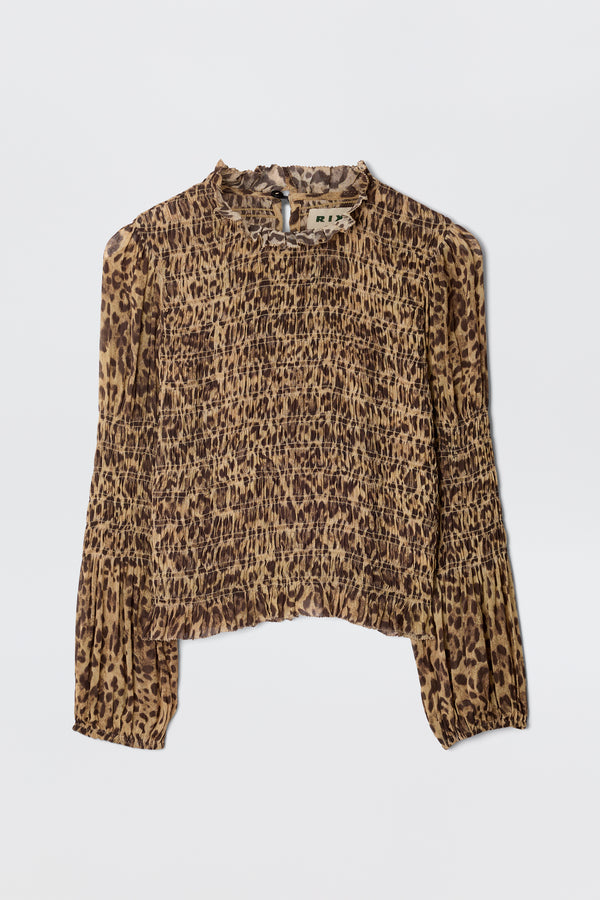 The Gardenia - Mila Leopard Brown blouse features a vintage-inspired, long-sleeve, high-neck design with a brown and black leopard print on lightweight georgette fabric, accented by elegant ruffle trim.