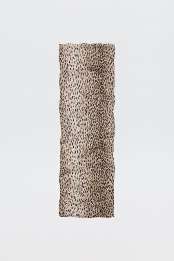 The Julien Scarf Antelope Spot Black features a rectangular crinkled-georgette fabric with a beige base and black irregular antelope spots, shown on a plain white background—perfect for expressing your wild side.