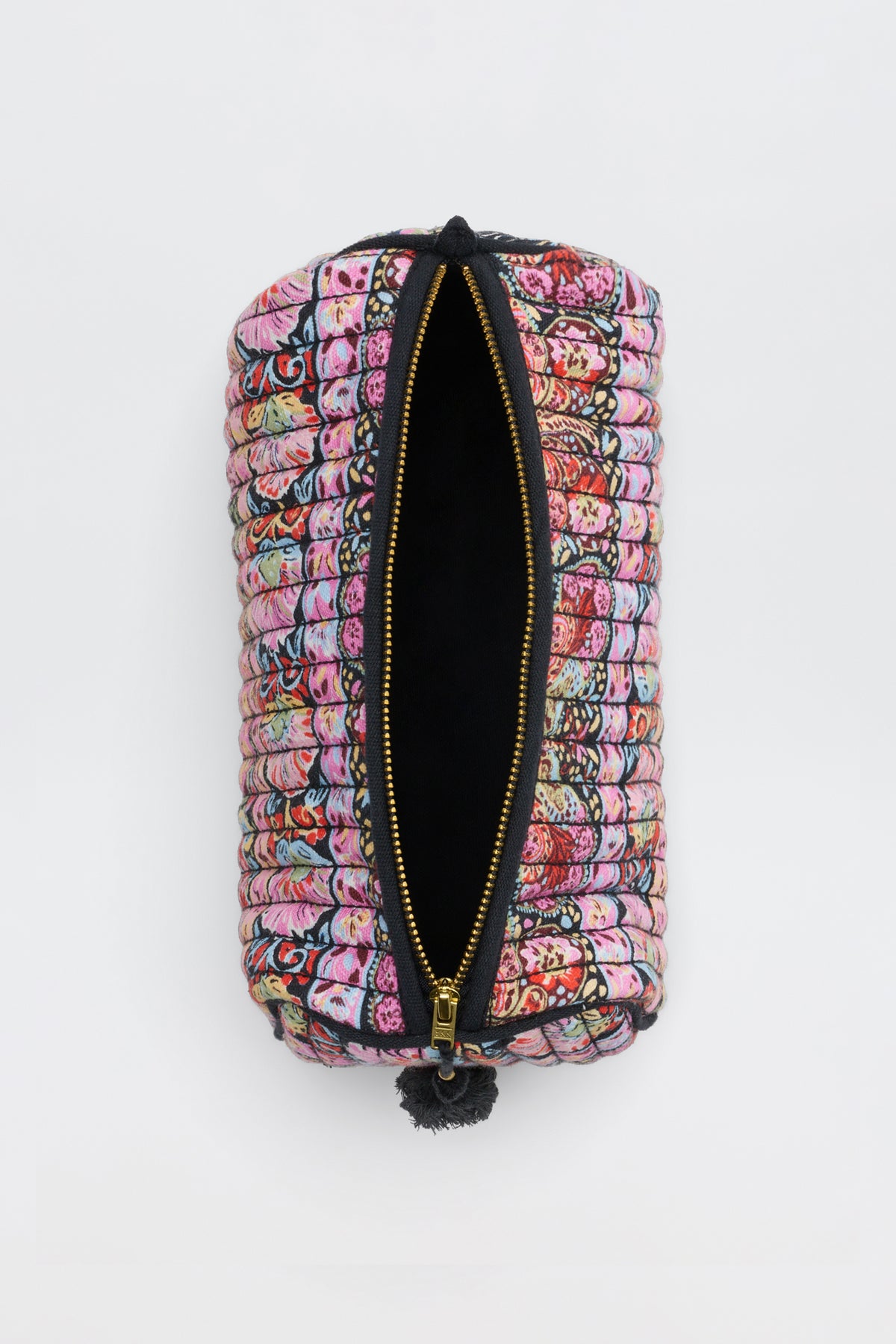 The Jadina - Cara Stripe Black is a colorful, cylindrical fabric pouch featuring intricate multicolored embroidery and a gold zipper, shown open to reveal a black interior against a plain white background.