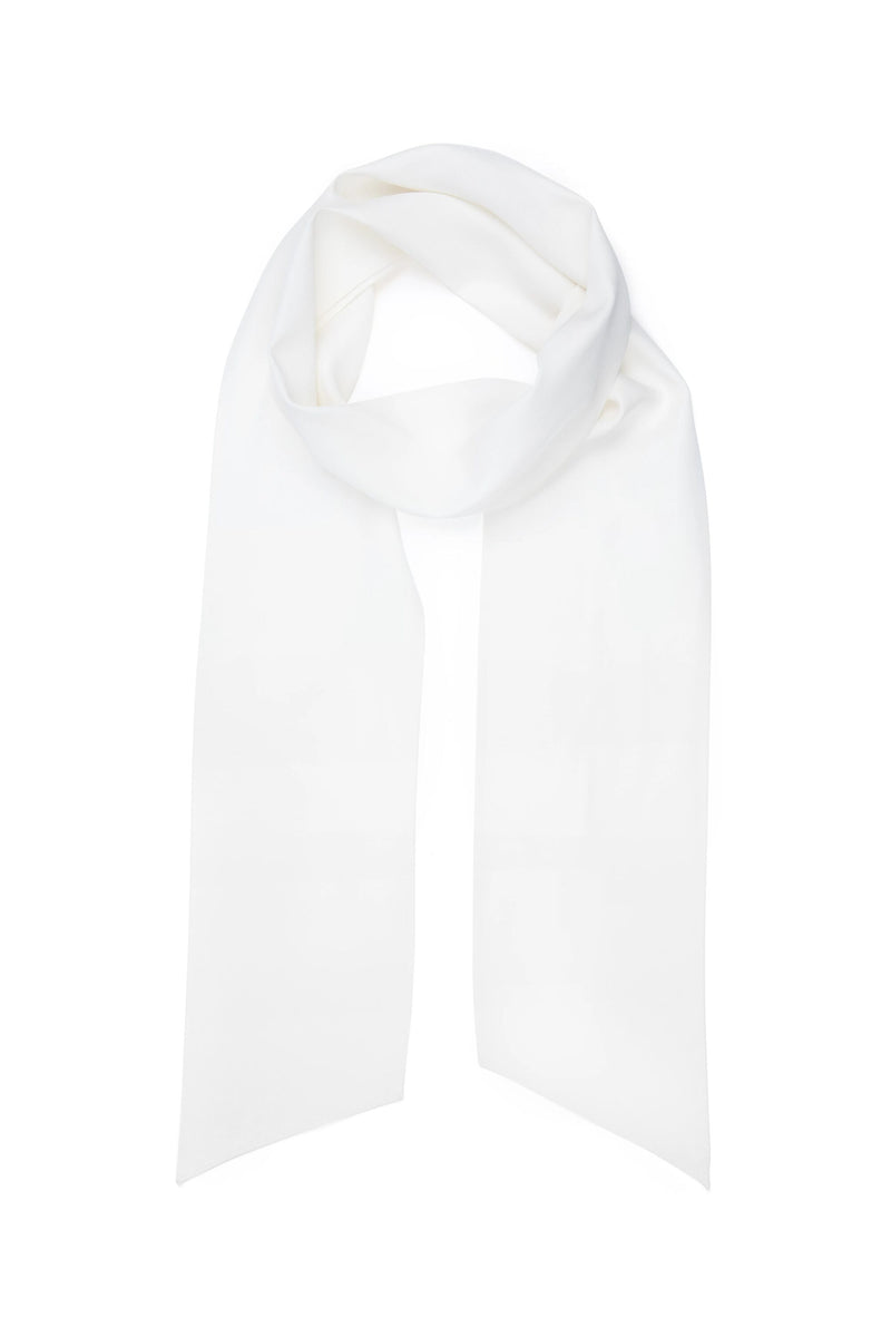 The "Hermione - Satin Back Silk Crepe" is a long, plain white scarf with pointed ends, laid flat on a white background and loosely looped at the top—an elegant bridal or wedding accessory.