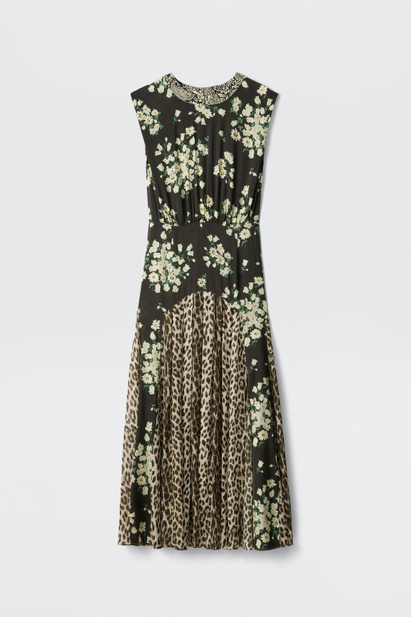 Coralie's Amelia Gremlin Mix Black is a sleeveless dress with a black background, featuring a white floral print on the top and midsection, a leopard print skirt, and an embellished trim at the neckline.